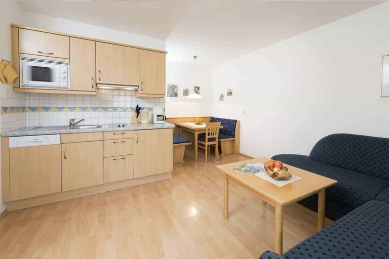 Bright Holiday Apartment at Pension Niederreiter Maria Alm with Kitchen, Seating Area, and Couch